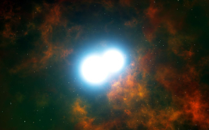 Ilustración de la parte central de la nebulosa planetaria Henize 2-428, con dos estrellas enanas blancas que se irán acercando. / http://www.agenciasinc.es